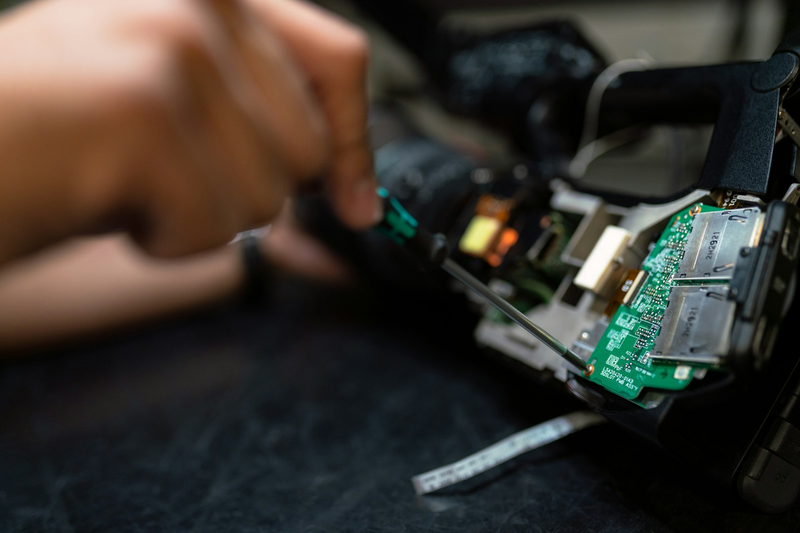 Computer Hospital technician performing precision repair
